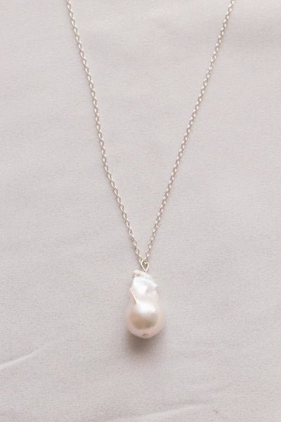 Baroque Pearl Pendant In Silver